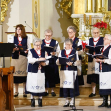 Wspólne kolędowanie parafian. Ofiarowanie świec